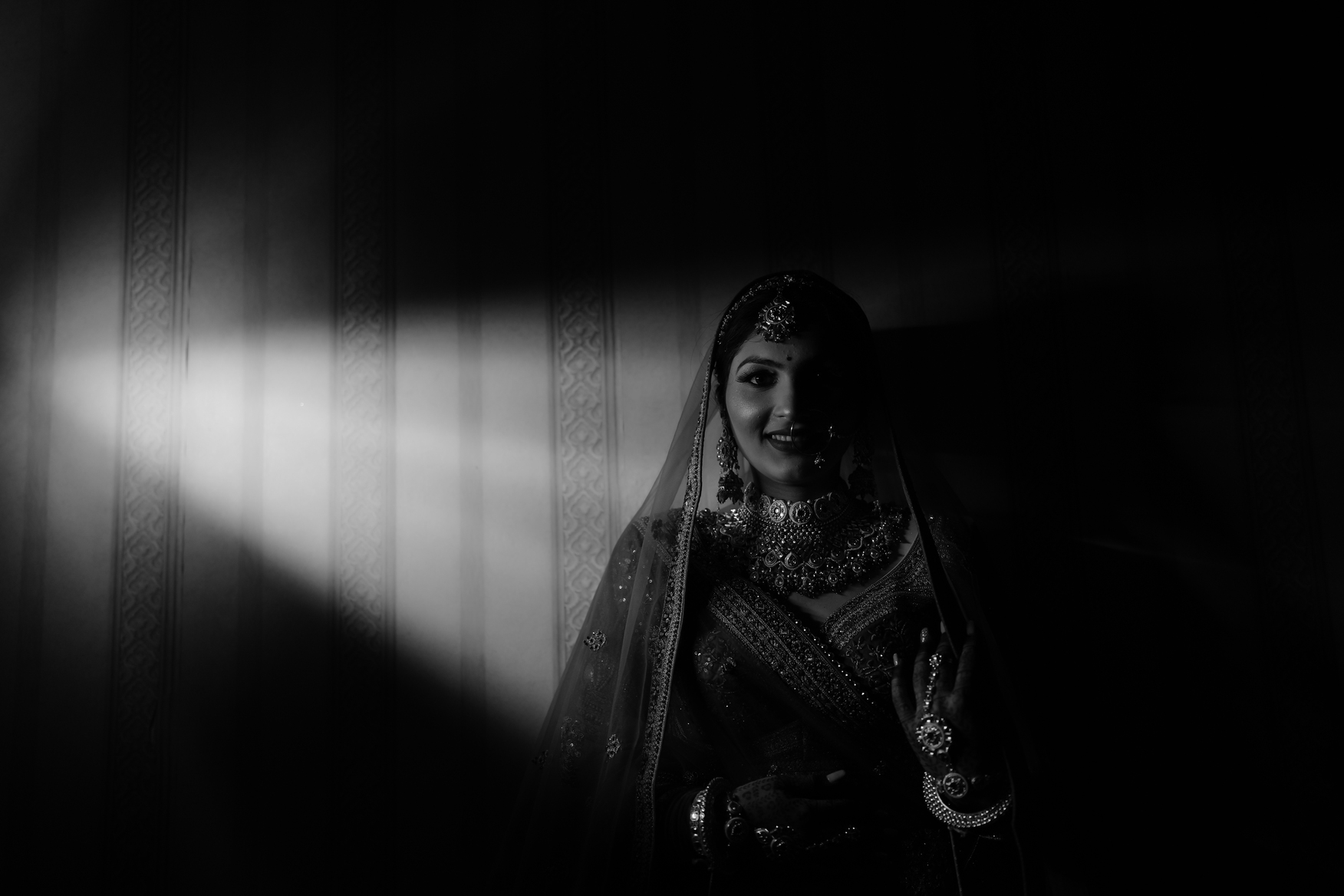 Bride in warm sunlight during a bridal portrait session